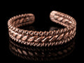 Brazalete de cobre Escudo de Venus, tres bandas con centro martillado